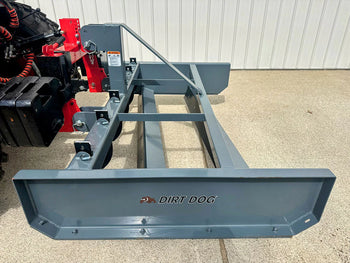 Dirt Dog gray landscape scraper attachment with durable frame, designed for heavy-duty outdoor use.
