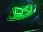 Green LED car headlights with stylish design for enhanced visibility and modern look.